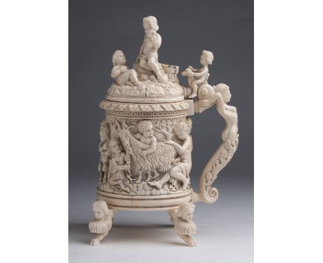 An ivory tankard finely carved with Bacchanalian scenes, Venus, Putti and Satyrs - Germany, 19th Century; ; 28 cm, 11 1/32 in