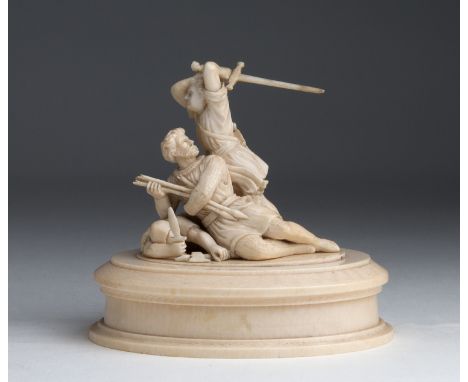 A carved ivory figural group depicting fight scene -  probably France, 19th Century; ; on a ivory base. 11.5 cm, 4 17/32 in h