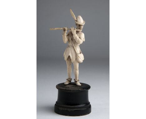 "The Pied Piper of Hamelin". A carved ivory figure - probably Germany, 19th Century; ; on a wooden base. 16.1 cm, 6 11/32 in 