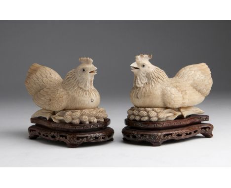 A pair of carved ivory opium boxes depicting nesting hens with spray of millet - China,  early 20th Century (pre-1947); ; on 