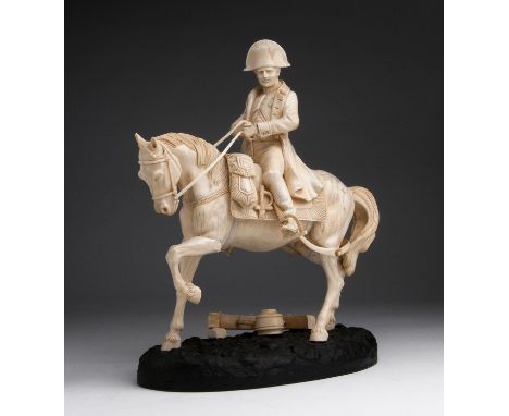 "Napoleon". A carved ivory equestrian figure - France, 19th Century.; ; on a ivory base. 26.5 cm, 10 7/16 in high overall, ba