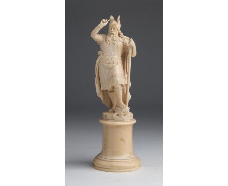 A carved ivory figure depicting a Viking warrior -  probably France late 19th / early 20th Century (pre-1947); ; on a ivory b