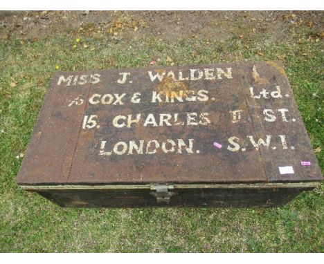 A tin trunk, signed