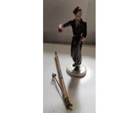 An Hartwig &amp; Co Katshutte Art Deco model of a lady skier, with original pair of wooden skis, af, height 12ins - There is 