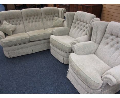 LOUNGE SUITE comprising three seater sofa and two armchairs in a classically patterned pastel colour