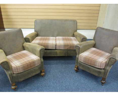 VINTAGE THREE PIECE SUITE comprising compact re-upholstered leather sofa with stud detail and tartan upholstered cushions and