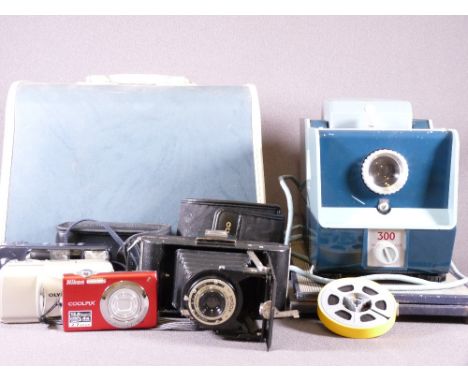 CAMERA ITEMS and a cased projector by Patterson