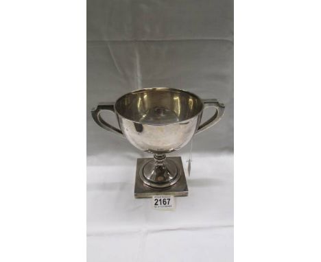 A silver Singapore Yacht club trophy, 490 grams.