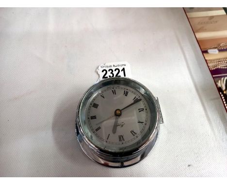 A chrome plated 'Marpro' yacht/boat clock. works but unable to set alarm, back diameter 8.75 cm, 4cm deep.
