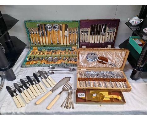 A selection of vintage cased cutlery including Royal Albert cake slice