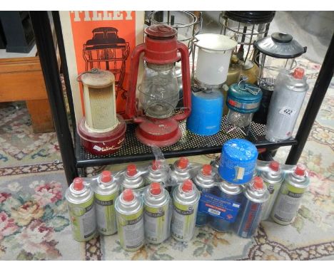 A boxed Tilley lamp and other lamps together with approximately 16 Butagas cylinders,. COLLECT ONLY.