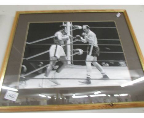 .&nbsp;A black and white photograph/print of the boxing match between Muhammad Ali and Henry Cooper in 1966.&nbsp;Frame size 