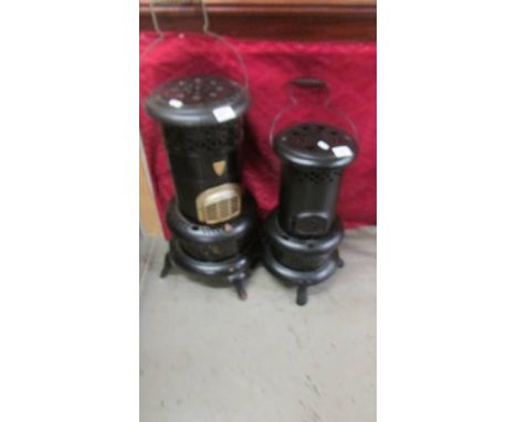 Two vintage paraffin heaters (small one missing its burner) COLLECT ONLY.