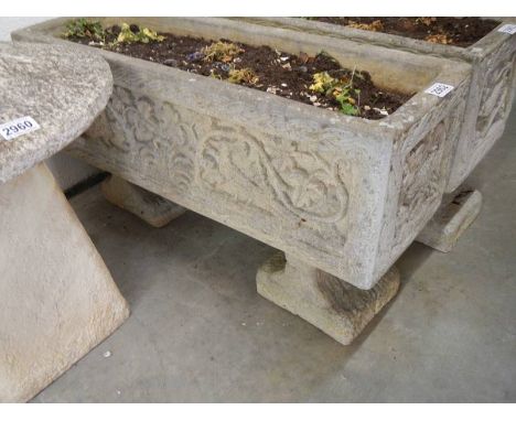 A garden planter with decoration on sides, 17 x 80 x 44 cm high. COLLECT ONLY.