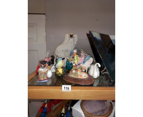 A large collection of ceramic animals