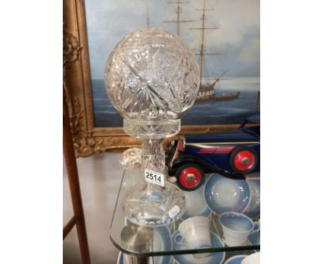 A mid Victorian cut glass table lamp.