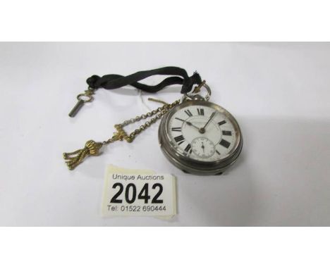 A silver pocket watch by Harrotini &amp; Son, Bradford, watch and chronometer manufacturers, with key and in good working ord