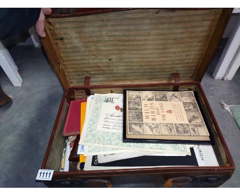 A vintage suitcase of ephemera etc.