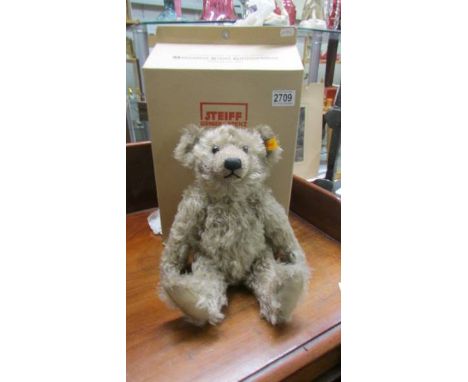 A boxed Steiff 125th anniversary Richard Steiff Teddy bear with growler.
