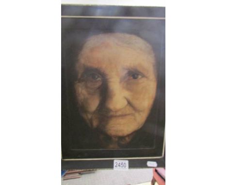 A 19th century oil on canvas portrait of an elderly lady mounted on board and initialled GW.
