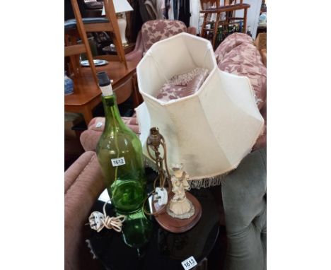 A large green bottle lamp and a figural lamp. COLLECT ONLY.