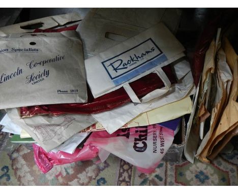 A collection of vintage carrier bags, paper&nbsp; &amp; plastic.