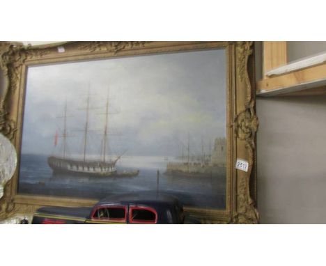 A large framed oil on canvas seascape. COLLECT ONLY.