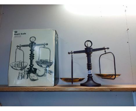 A vintage style boxed Boots beam kitchen scales (no weights)