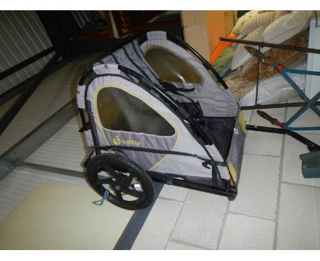 AN In-Step two person foldable bike trailer with harness, COLLECT ONLY.