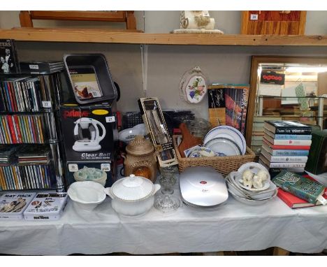 A good selection of kitchenalia including new kettle, jelly moulds, enamel plates, etc