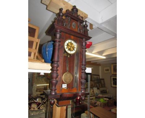 A Victorian mahogany wall clock. COLLECT ONLY.