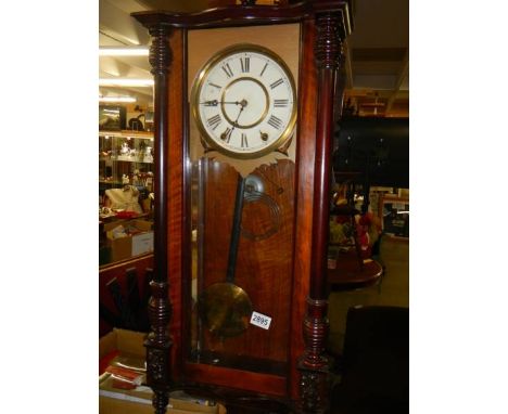 A mahogany Vienna wall clock in working order. COLLECT ONLY.