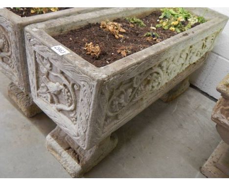 A garden planter with decoration on sides, 17 x 80 x 44 cm high. COLLECT ONLY.
