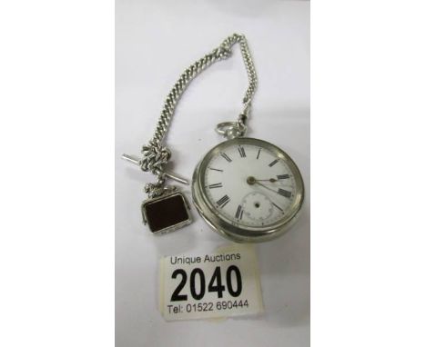 A pocket watch with heavy silver Albert chain.*CONDITION REPORT*Chain weight with fob 53.1gms.Fine scratches to stone.Silver 