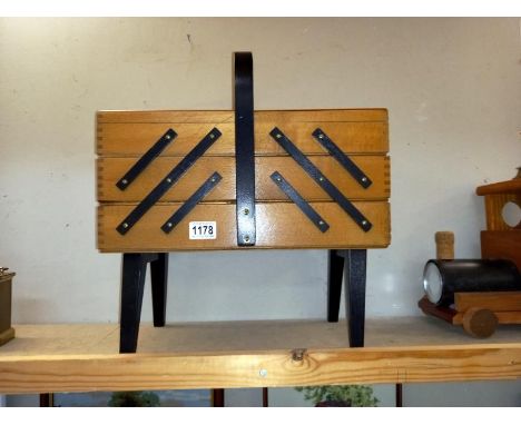 A vintage concertina sewing box