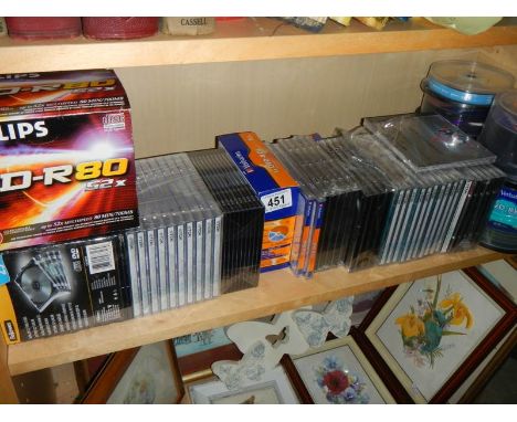 A large lot of unused DVD-R CDRW and DVD-RW discs.