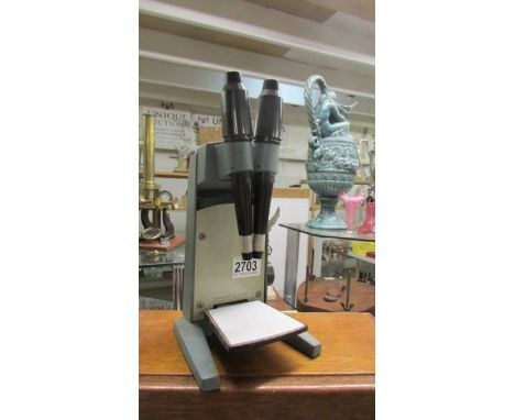 A Bausch &amp; Lamp, Made in USA, microscope.