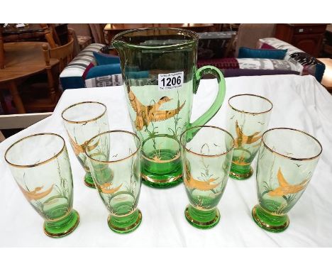 A vintage green glass juice/drinks set gold overlaid with ducks in flight, made in Germany COLLECT ONLY