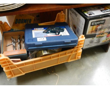 A steamer and a box of tools.
