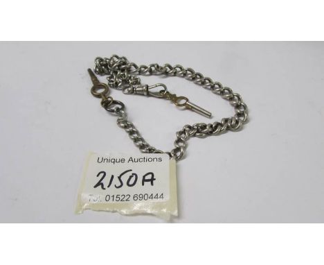 A silver watch chain with two keys. 33 grams.