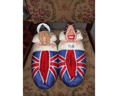 A pair of vintage Spitting Image slippers of The Queen &amp; Prince Philip