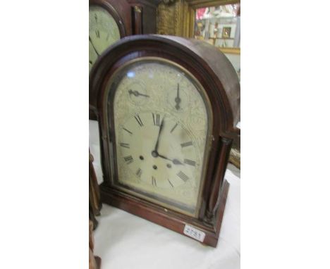 A mahogany 8 day bracket clock. In working order.