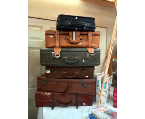 6 vintage suitcases