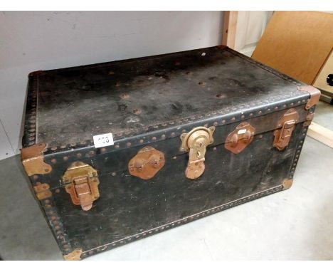 A good vintage studded travel trunk