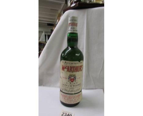 A bottle of McArthurs select Scotch whisky.