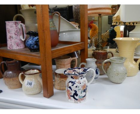 A mixed lot of ceramic jugs.