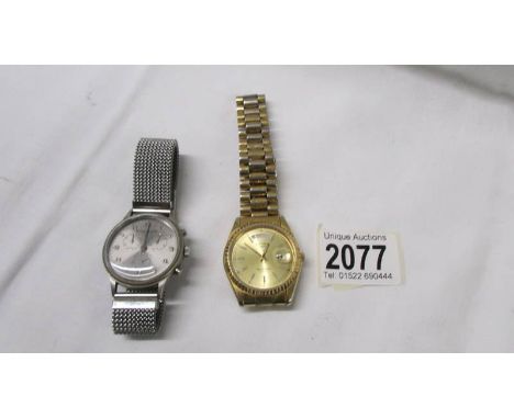 A Rotary quartz wrist watch and another wrist watch.
