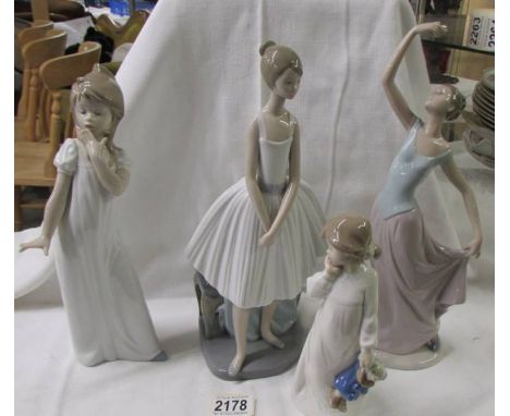 Four NAO by Lladro including rarer examples.