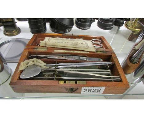 A cased set of assorted instruments/tools.