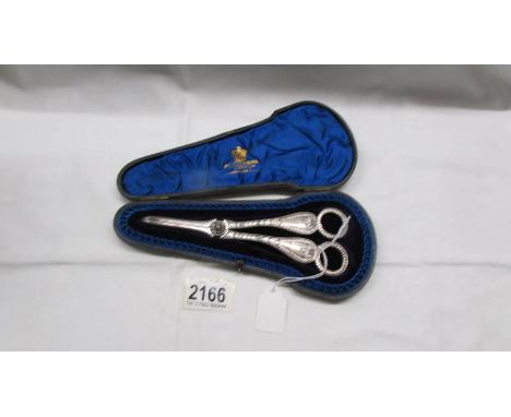 A cased pair of Victorian grape scissors.*CONDITION REPORT*In good condition, scissors would benefit from a light polish.Case